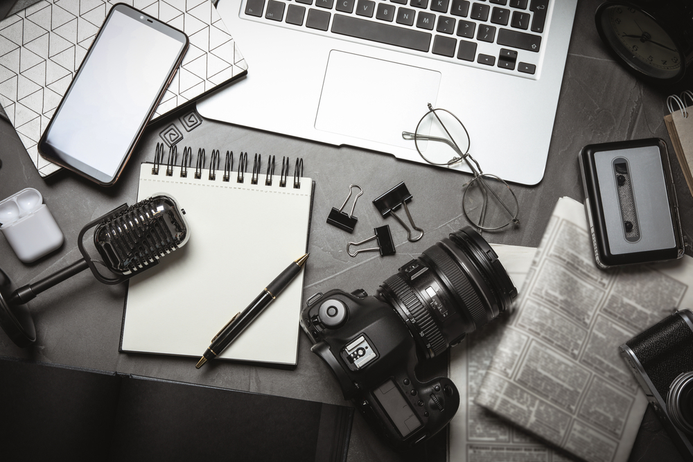Flat,Lay,Composition,With,Equipment,For,Journalist,On,Grey,Table